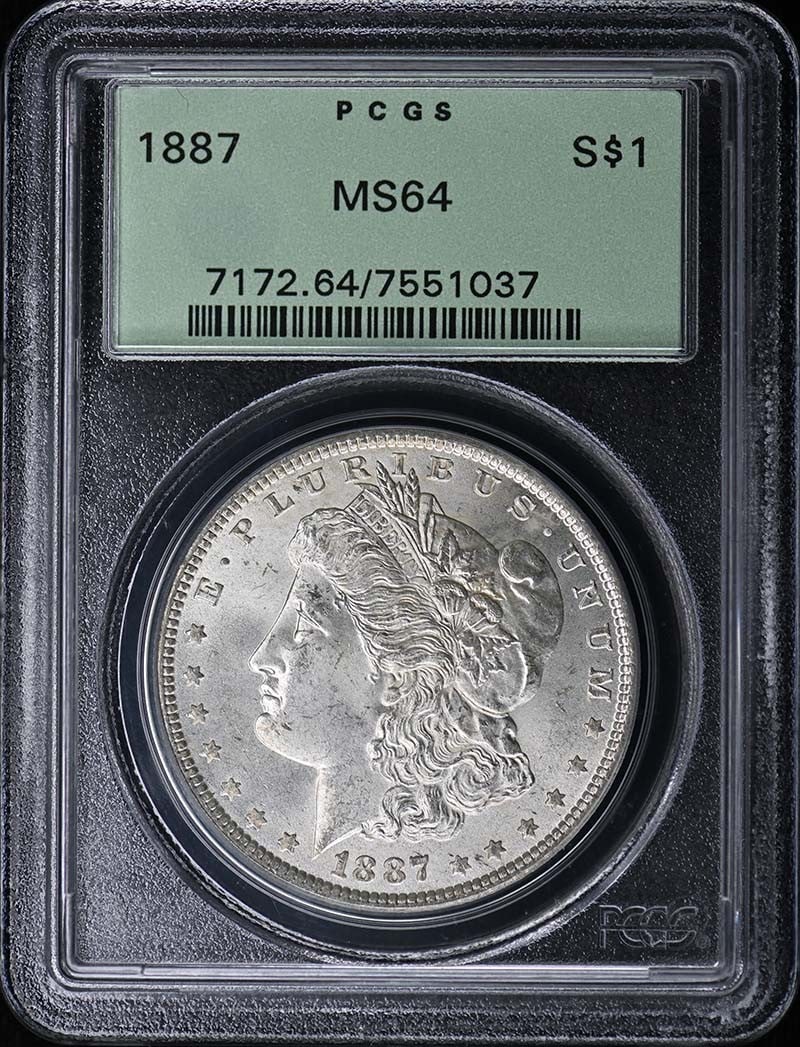 PCGS MS64 1887 Morgan Silver Dollar $1: PCGS MS64 1887 Morgan Silver Dollar $1 1887 Morgan Dollar certified by PCGS and graded MS64. This uncirculated United States silver dollar is a pre-owned coin from the Philadelphia Mint. Specification