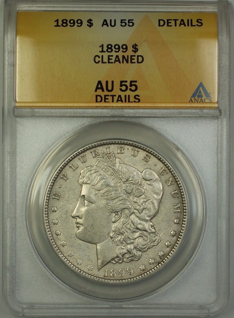 ANACS AU-55 Details Cleaned 1899 Morgan Dollar $1 Silver Coin: ANACS AU-55 Details Cleaned 1899 Morgan Dollar $1 Silver Coin 1899 Morgan Silver Dollar $1 coin from the United States, certified by ANACS and graded AU-55 Details Cleaned. This circulated silver doll