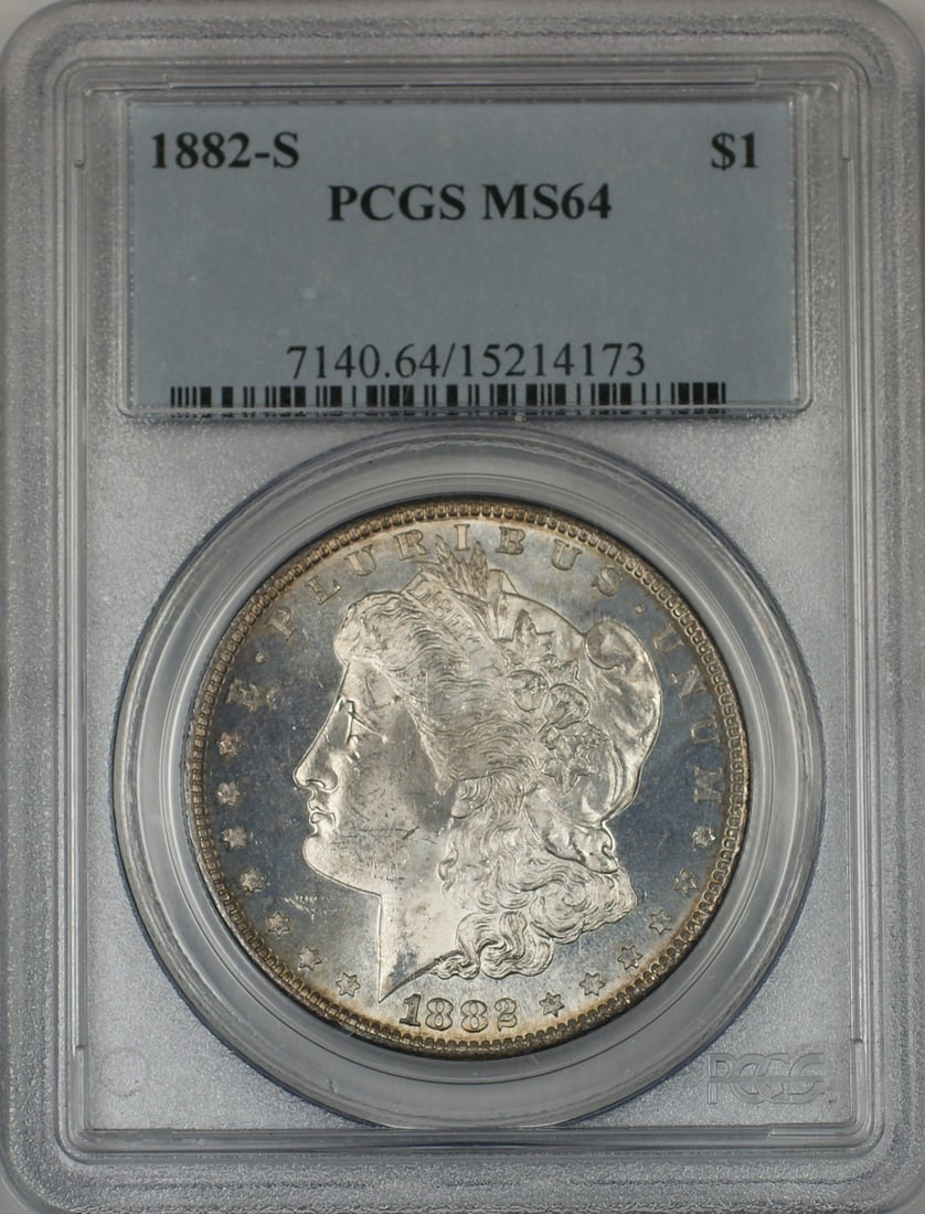 PCGS MS64 1882-S Morgan Silver Dollar Prooflike Toned Reverse: PCGS MS64 1882-S Morgan Silver Dollar Prooflike Toned Reverse 1882-S Morgan Silver $1 coin certified by PCGS and graded MS-64. This uncirculated United States silver dollar features a beautifully tone