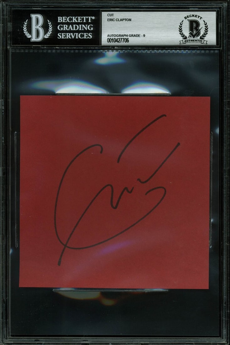 Eric Clapton Autographed Cut Signature BAS Graded Mint 9 Slabbed: Eric Clapton Autographed Cut Signature BAS Graded Mint 9 Slabbed This item is an original Eric Clapton autographed cut signature, featuring the artist's authentic signature. The autograph has been pro