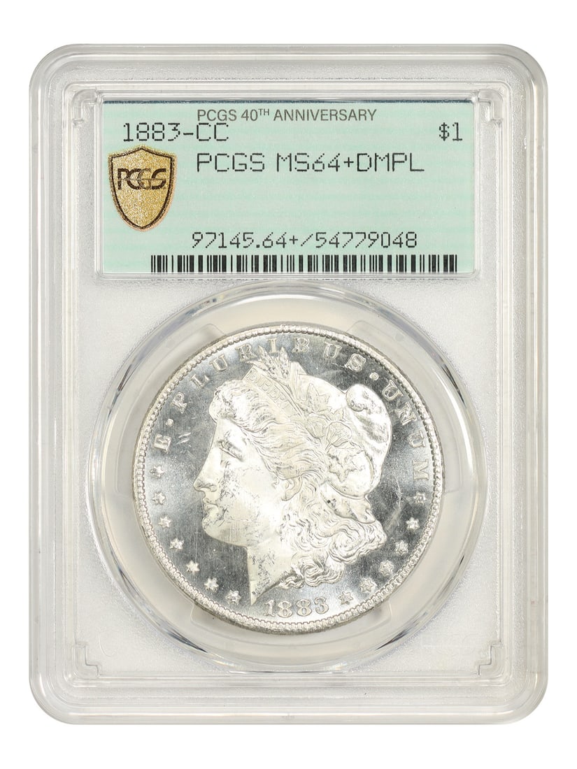1883 Carson City Morgan Dollar PCGS MS64+DMPL $1 Coin: 1883 Carson City Morgan Dollar PCGS MS64+DMPL $1 Coin 1883-CC Morgan Dollar certified by PCGS as MS64+DMPL. This uncirculated Carson City issue is described as stark white with mirrored surfaces in st