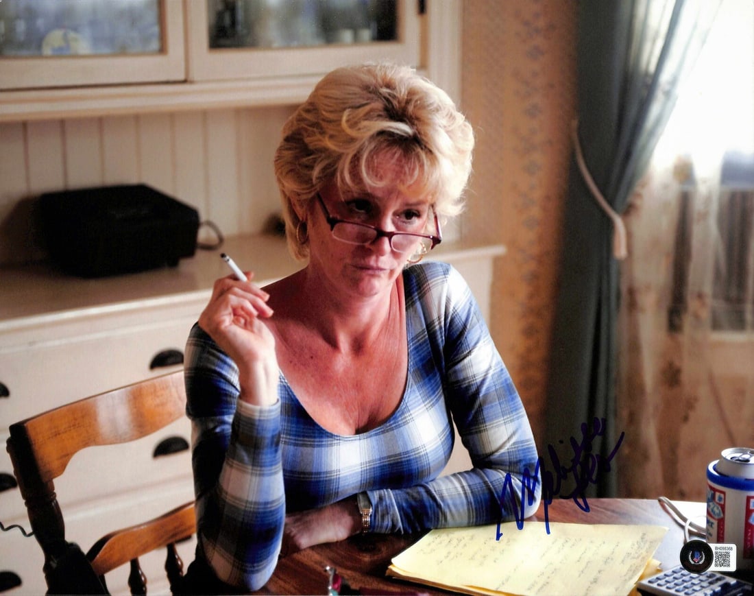 Melissa Leo autographed 11x14 The Fighter photo Beckett certified: Melissa Leo autographed 11x14 The Fighter photo Beckett certified Original 11x14 photograph from The Fighter, signed by Melissa Leo in blue permanent marker. The autograph is authenticated by Beckett 