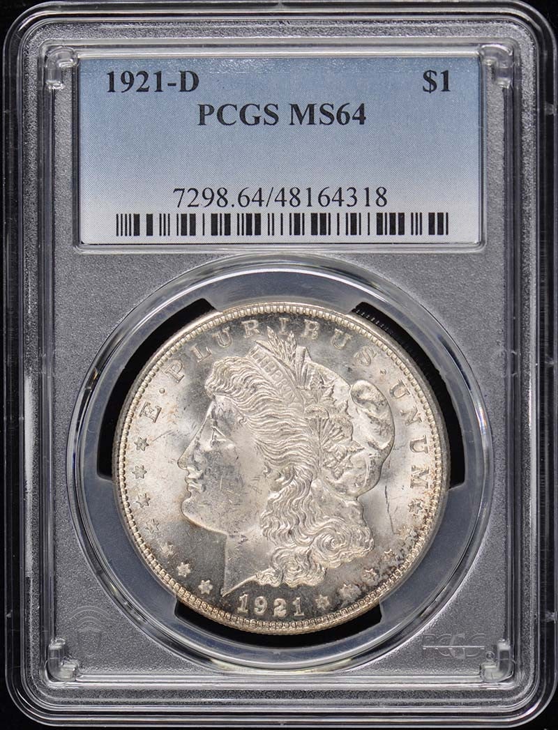 1921-D Morgan Dollar PCGS MS64 Uncirculated Denver Mint: 1921-D Morgan Dollar PCGS MS64 Uncirculated Denver Mint This 1921-D Morgan Dollar is a stunning example of historic U.S. coinage, certified by PCGS with a grade of MS64. Struck in Denver, this uncircu