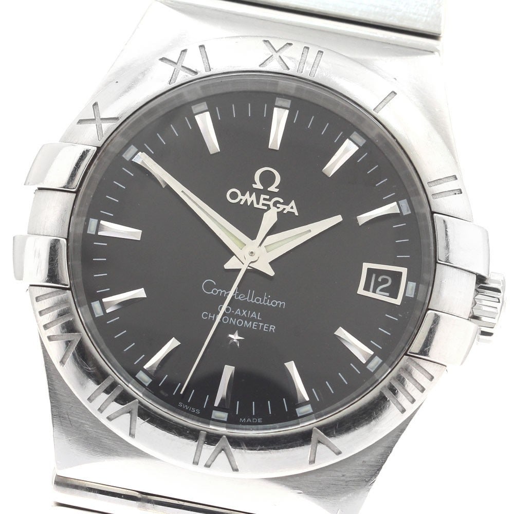 Omega Constellation Date Automatic Mens Stainless Steel Watch Ref 123.10.35.20.01.001: Omega Constellation Date Automatic Mens Stainless Steel Watch Ref 123.10.35.20.01.001 OMEGA Constellation Date men's wristwatch with a black dial and automatic movement. This watch-only offering featu