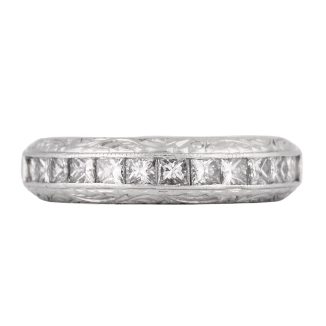 Art Carved Platinum 900 Diamond Band Ring Princess Cut 1.00 CTW: Art Carved Platinum 900 Diamond Band Ring Princess Cut 1.00 CTW Vintage platinum band ring set with natural princess cut diamonds. This pre-owned ring features art carved sides and presents in very go