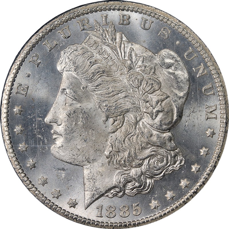 NGC MS63 1885 CC GSA Morgan Silver Dollar Blast White: NGC MS63 1885 CC GSA Morgan Silver Dollar Blast White Original 1885-CC GSA Morgan Silver Dollar certified by NGC as MS63. This uncirculated silver coin is described as blast white with strong strike, 