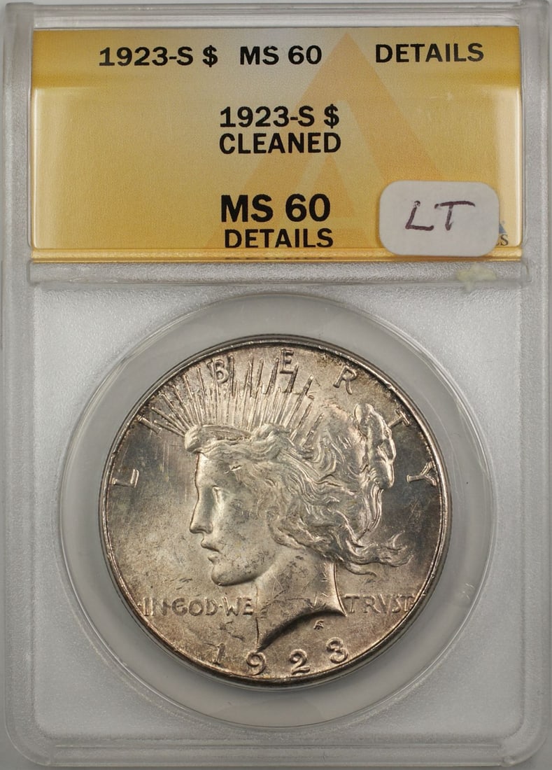 ANACS MS 60 1923-S Peace Dollar $1 Silver Cleaned Light Toning: ANACS MS 60 1923-S Peace Dollar $1 Silver Cleaned Light Toning 1923-S Peace Silver Dollar coin certified by ANACS and graded MS 60 with cleaned details. This pre-owned silver $1 coin features light to