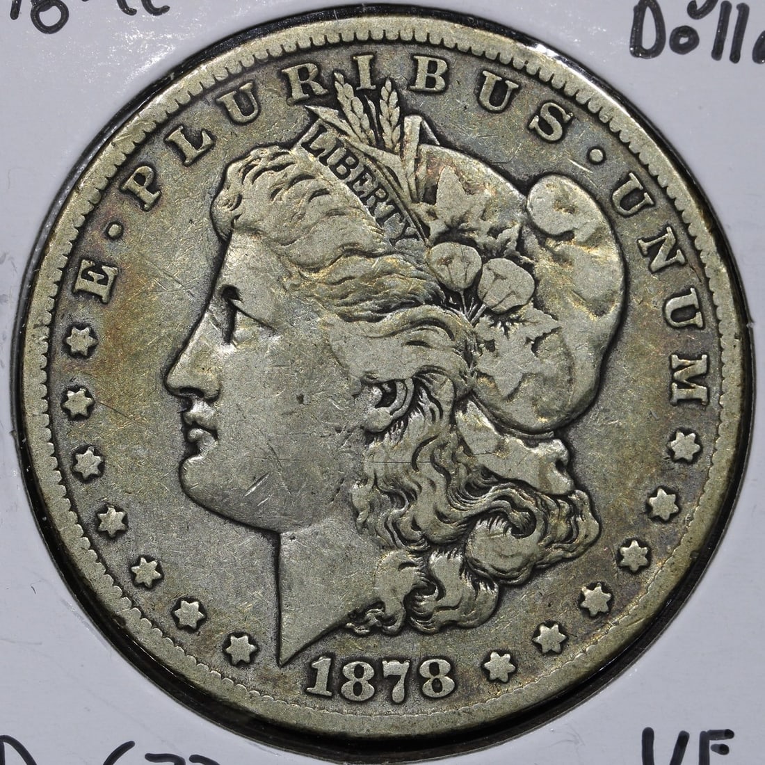 Carson City 1878 Morgan Silver Dollar $1 Key Date VF: Carson City 1878 Morgan Silver Dollar $1 Key Date VF 1878 Carson City Morgan Silver Dollar in Very Fine condition. This pre-owned key date $1 coin is struck in silver and represents a sought-after iss
