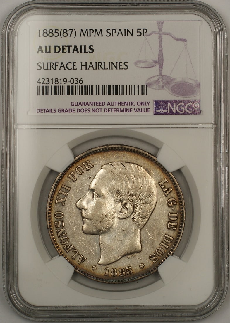 Spain 1885 5 Pesetas Silver Coin NGC AU Details Surface Hairlines: Spain 1885 5 Pesetas Silver Coin NGC AU Details Surface Hairlines 1885(87) Spain 5 Pesetas silver coin certified by NGC and graded AU Details, with surface hairlines noted. This circulated pre-owned c