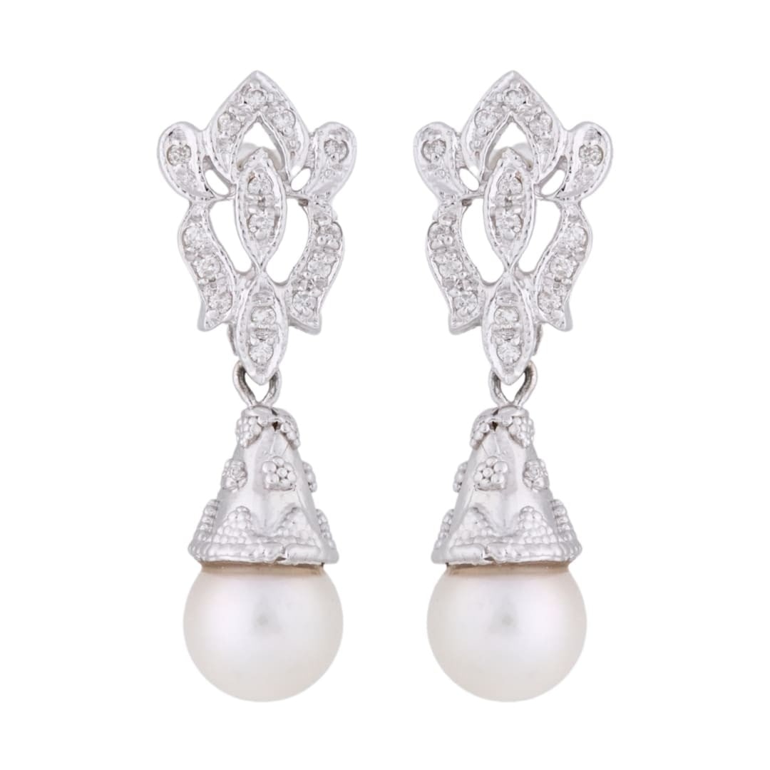 Unbranded 18K White Gold Pearl Diamond Drop Earrings 8.5mm: Unbranded 18K White Gold Pearl Diamond Drop Earrings 8.5mm A refined pair of unbranded dangle earrings featuring round cultured pearls and diamond accents in 18K white gold. The pearls display nice lu