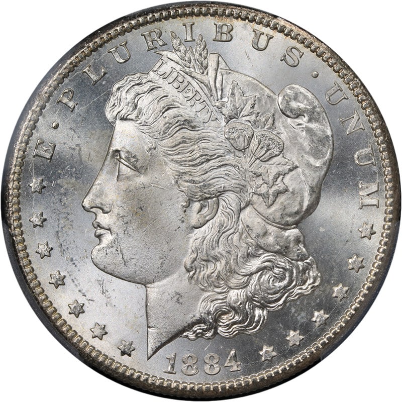 PCGS MS64 1884-CC Morgan Silver Dollar Uncirculated Silver Coin: PCGS MS64 1884-CC Morgan Silver Dollar Uncirculated Silver Coin An original 1884-CC Morgan Silver Dollar certified by PCGS and graded MS64. This uncirculated silver coin is described as having superb 