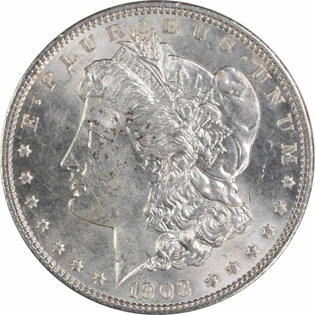1903 Uncirculated Morgan Silver Dollar $1 Uncertified: 1903 Uncirculated Morgan Silver Dollar $1 Uncertified 1903 Morgan Silver Dollar in BU grade. This uncirculated silver coin is uncertified and offered as a pre-owned piece. Specifications Coin: Morgan 