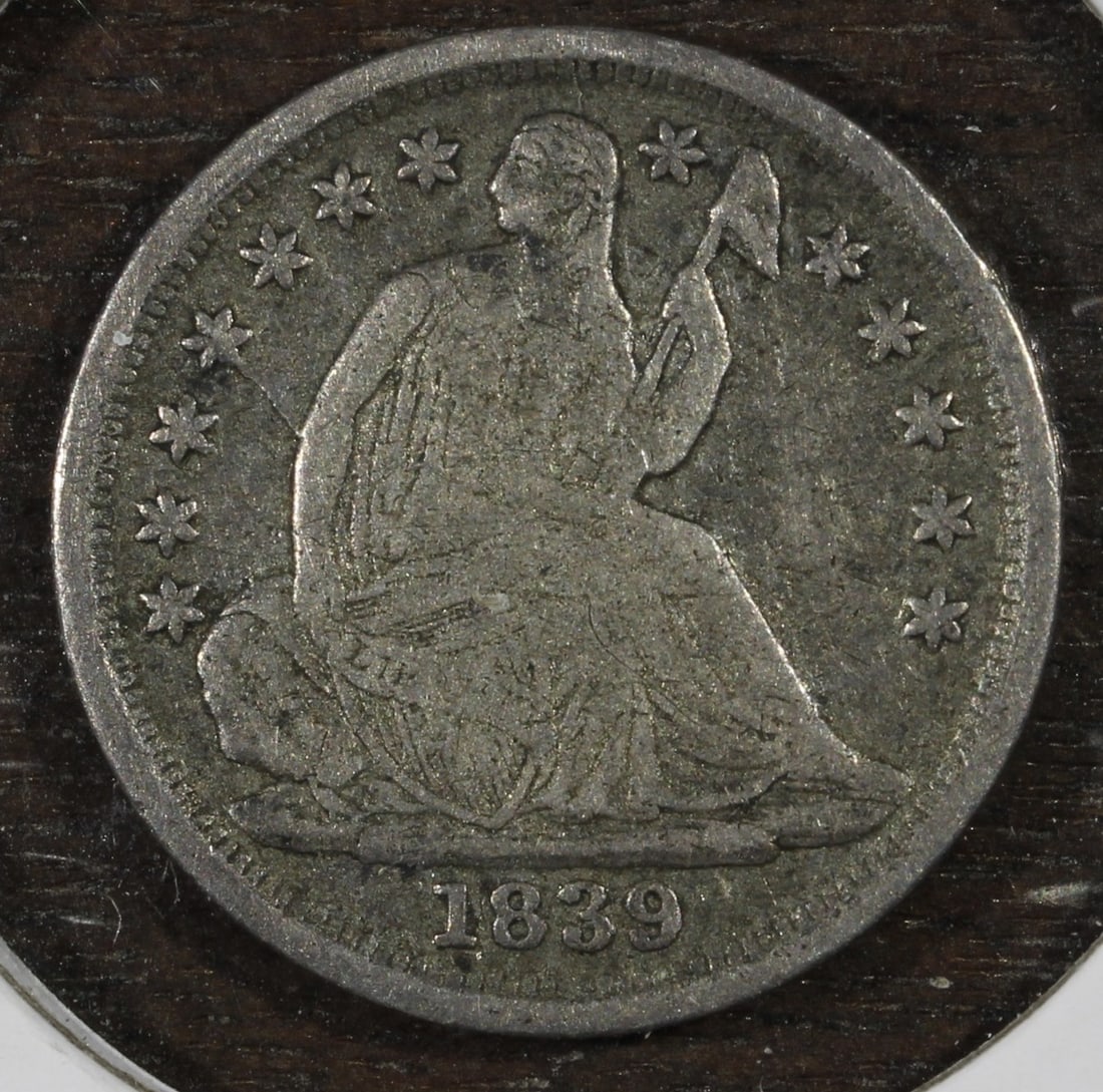 1839 O No Drapery Seated Half Dime Silver VF: 1839 O No Drapery Seated Half Dime Silver VF 1839 Seated Half Dime from the United States, struck in silver with the No Drapery variety. This pre-owned coin is identified as a Very Fine example. Speci
