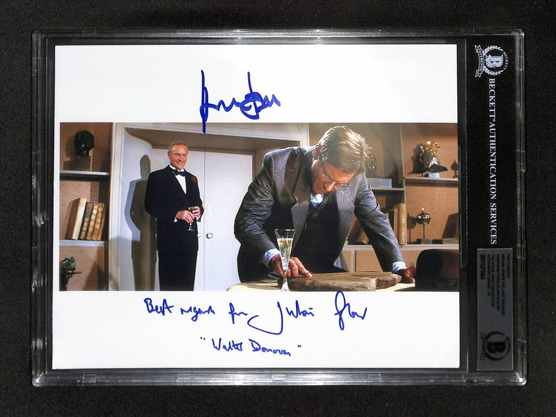 Indiana Jones Last Crusade 8x10 Photo Signed by Harrison Ford Julian Glover BAS 10: Indiana Jones Last Crusade 8x10 Photo Signed by Harrison Ford Julian Glover BAS 10 This is an original 8x10 color photograph from Indiana Jones and the Last Crusade, signed in blue permanent marker by