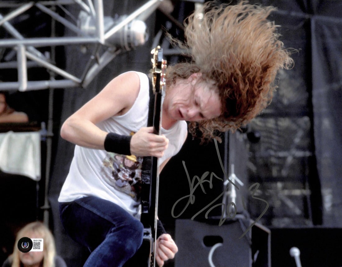 Signed 11x14 Photo Jason Newsted Beckett Authenticated: Signed 11x14 Photo Jason Newsted Beckett Authenticated Original 11x14 autographed photograph signed by Jason Newsted, former Metallica bassist, in silver permanent marker. This pre-owned piece is auth