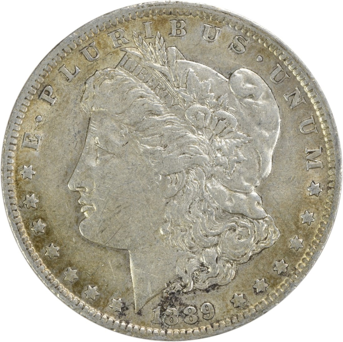 1889-O Morgan Silver Dollar EF Uncertified New Orleans Mint: 1889-O Morgan Silver Dollar EF Uncertified New Orleans Mint This 1889-O Morgan Silver Dollar features a striking design by George T. Morgan and is a notable piece for collectors. The coin is circulate