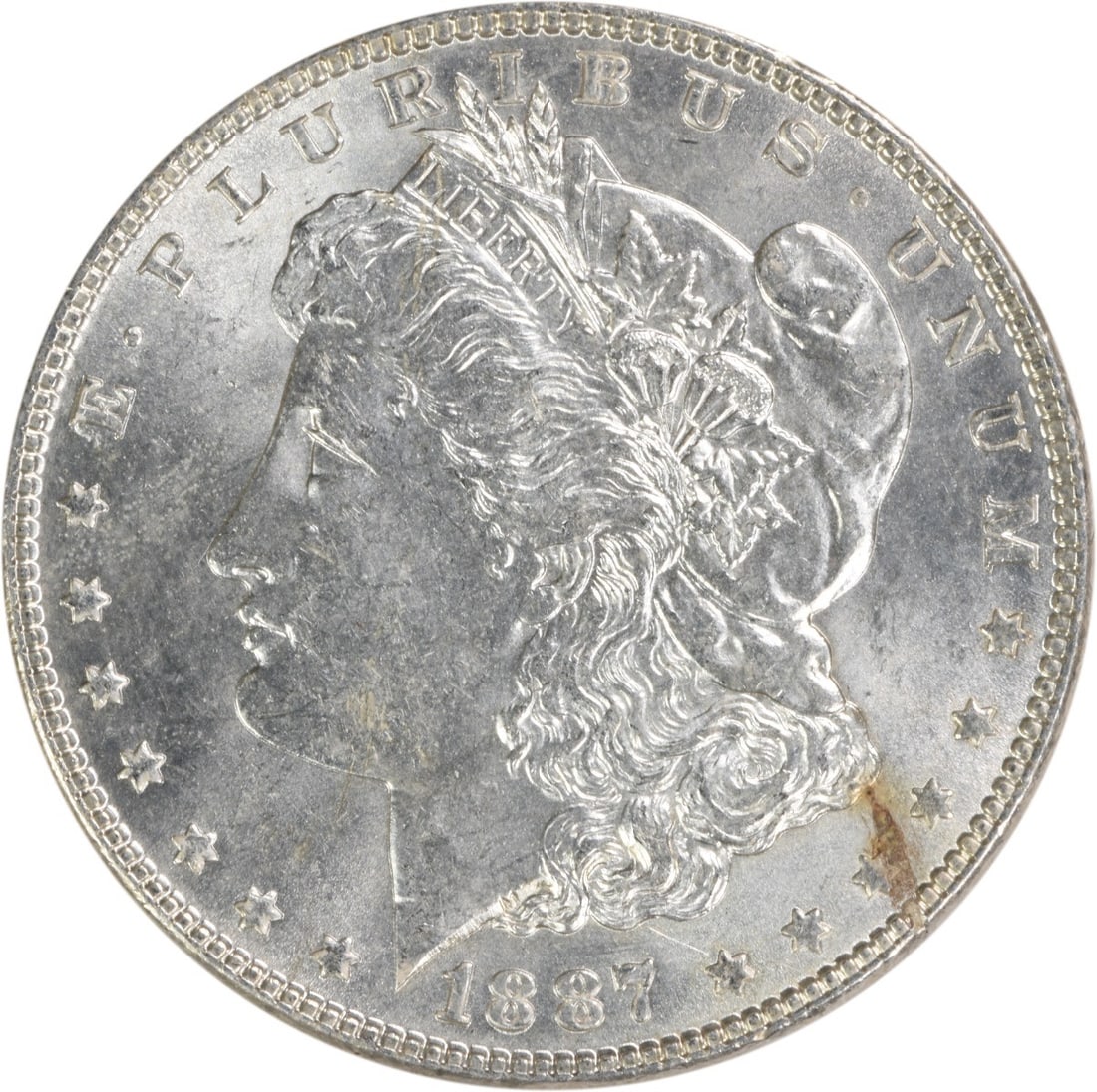 Brilliant Uncirculated 1887 Silver Morgan Dollar Uncertified US Coin: Brilliant Uncirculated 1887 Silver Morgan Dollar Uncertified US Coin This 1887 Morgan Silver Dollar is an uncirculated coin in Brilliant Uncirculated (BU) condition. It is composed of silver, was mint
