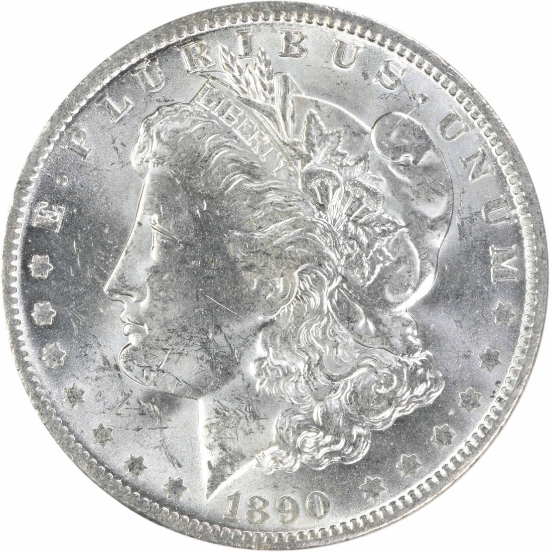 1890 O Morgan Silver Dollar $1 Uncirculated Uncertified: 1890 O Morgan Silver Dollar $1 Uncirculated Uncertified 1890-O Morgan Silver Dollar in uncirculated, uncertified condition. This pre-owned coin features the classic Morgan design and was struck at the