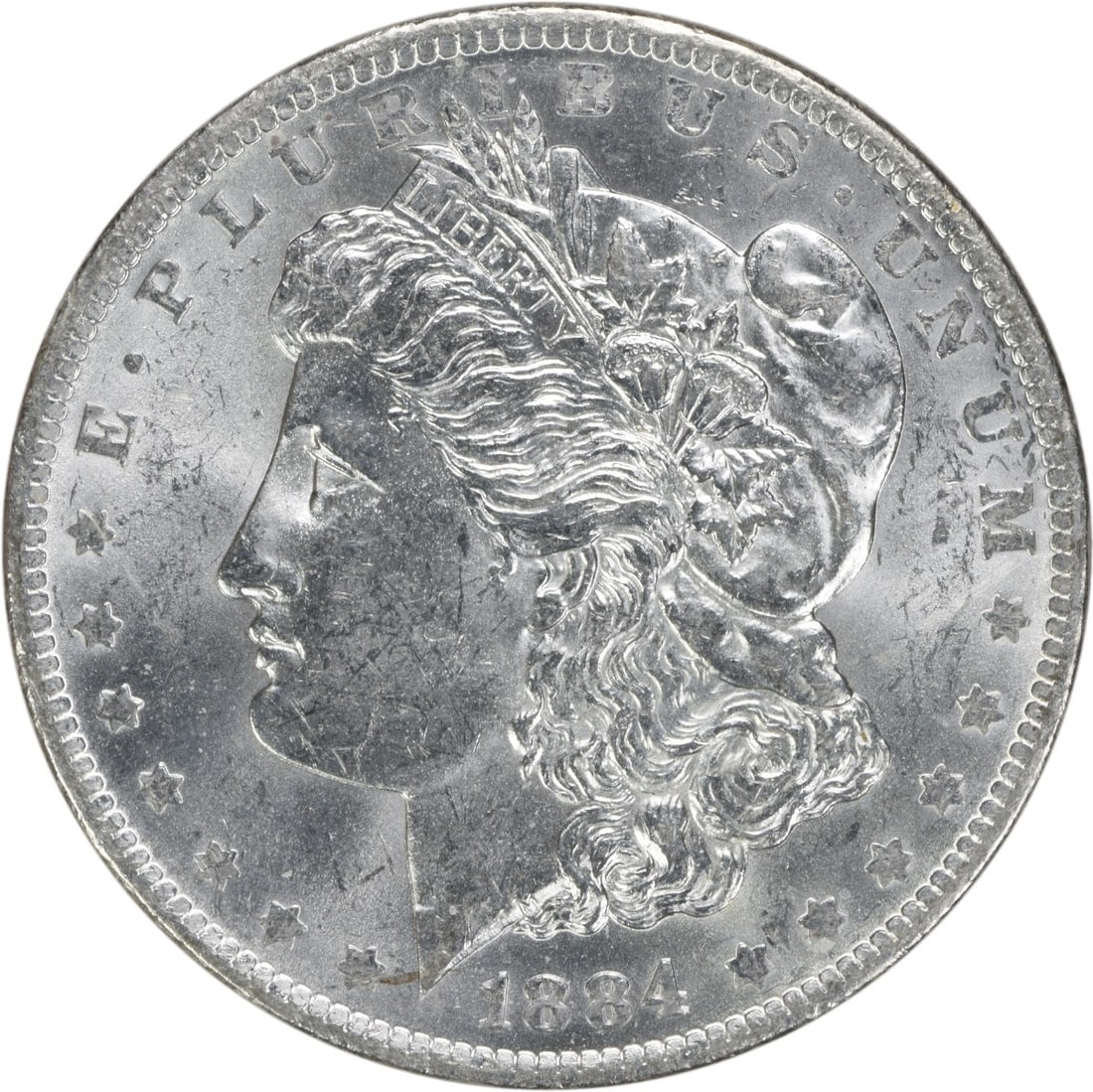 Uncirculated 1884 O Morgan Silver Dollar Brilliant Uncertified US Coin: Uncirculated 1884 O Morgan Silver Dollar Brilliant Uncertified US Coin This is an uncirculated 1884-O Morgan Silver Dollar featuring brilliant uncirculated (BU) condition. Minted at the New Orleans Mi