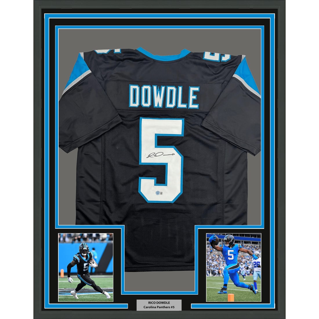 35x39 Framed Rico Dowdle Signed Carolina Panthers Black Jersey Beckett COA: 35x39 Framed Rico Dowdle Signed Carolina Panthers Black Jersey Beckett COA Professionally framed and matted black football jersey autographed by Rico Dowdle. This original signed piece includes two 5x