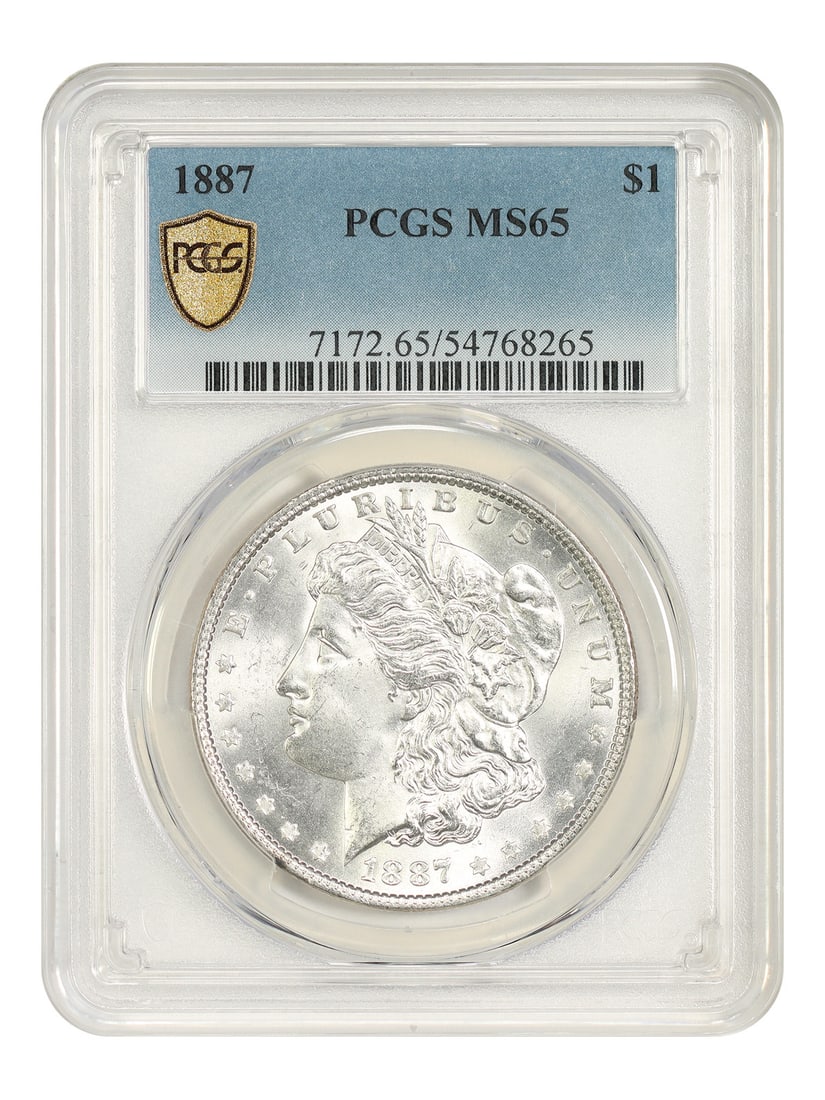 1887 Morgan Dollar $1 PCGS MS65 Philadelphia Mint Coin: 1887 Morgan Dollar $1 PCGS MS65 Philadelphia Mint Coin 1887 Morgan Dollar certified by PCGS in MS65 grade. This uncirculated Philadelphia issue is a popular collector date. It is considered a common d