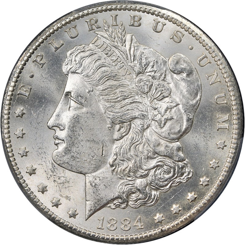 PCGS MS63 1884 CC Morgan Silver Dollar Blast White: PCGS MS63 1884 CC Morgan Silver Dollar Blast White 1884-CC Morgan Silver Dollar certified by PCGS as MS63. This uncirculated silver coin is described as blast white with strong strike, fantastic luste