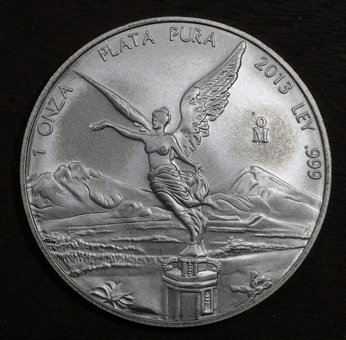 2013 Mexico Silver Libertad Onza 1 oz .999 Coin: 2013 Mexico Silver Libertad Onza 1 oz .999 Coin Pre-owned 2013-Mo Mexico Silver Libertad Onza bullion coin. This ungraded, uncertified coin contains 1 oz of .999 fine silver and is identified as a Mex