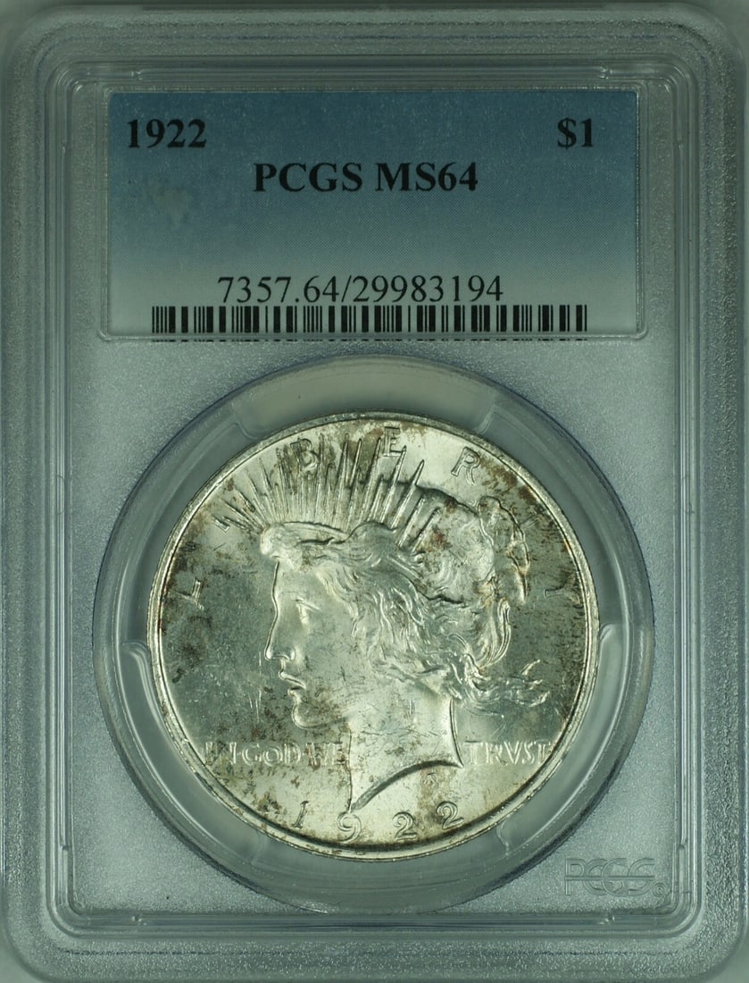 PCGS MS-64 1922 Peace Dollar $1 Silver Toned: PCGS MS-64 1922 Peace Dollar $1 Silver Toned This is a 1922 Peace Silver Dollar, certified by PCGS with a grade of MS-64. The coin was minted in Philadelphia and features a silver composition. It is u