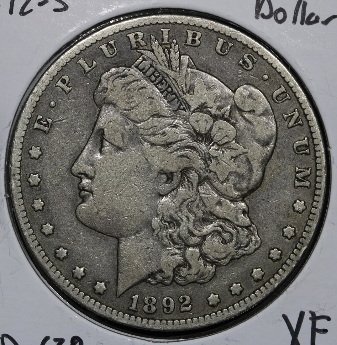 1892 S $1 Morgan Silver Coin XF Better Date San Francisco Mint: 1892 S $1 Morgan Silver Coin XF Better Date San Francisco Mint 1892-S Morgan Silver Dollar $1 in XF Extra Fine condition. This circulated, pre-owned coin is a better date issue from the United States.