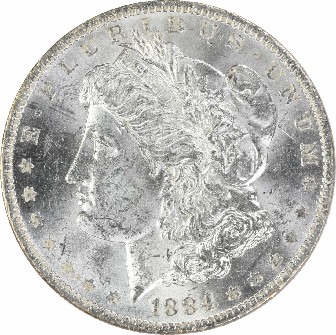 1884 O Morgan $1 Silver Coin Uncirculated Uncertified: 1884 O Morgan $1 Silver Coin Uncirculated Uncertified 1884-O Morgan Silver Dollar in uncirculated, pre-owned condition. This uncertified $1 coin is composed of silver and identified as a Morgan dollar