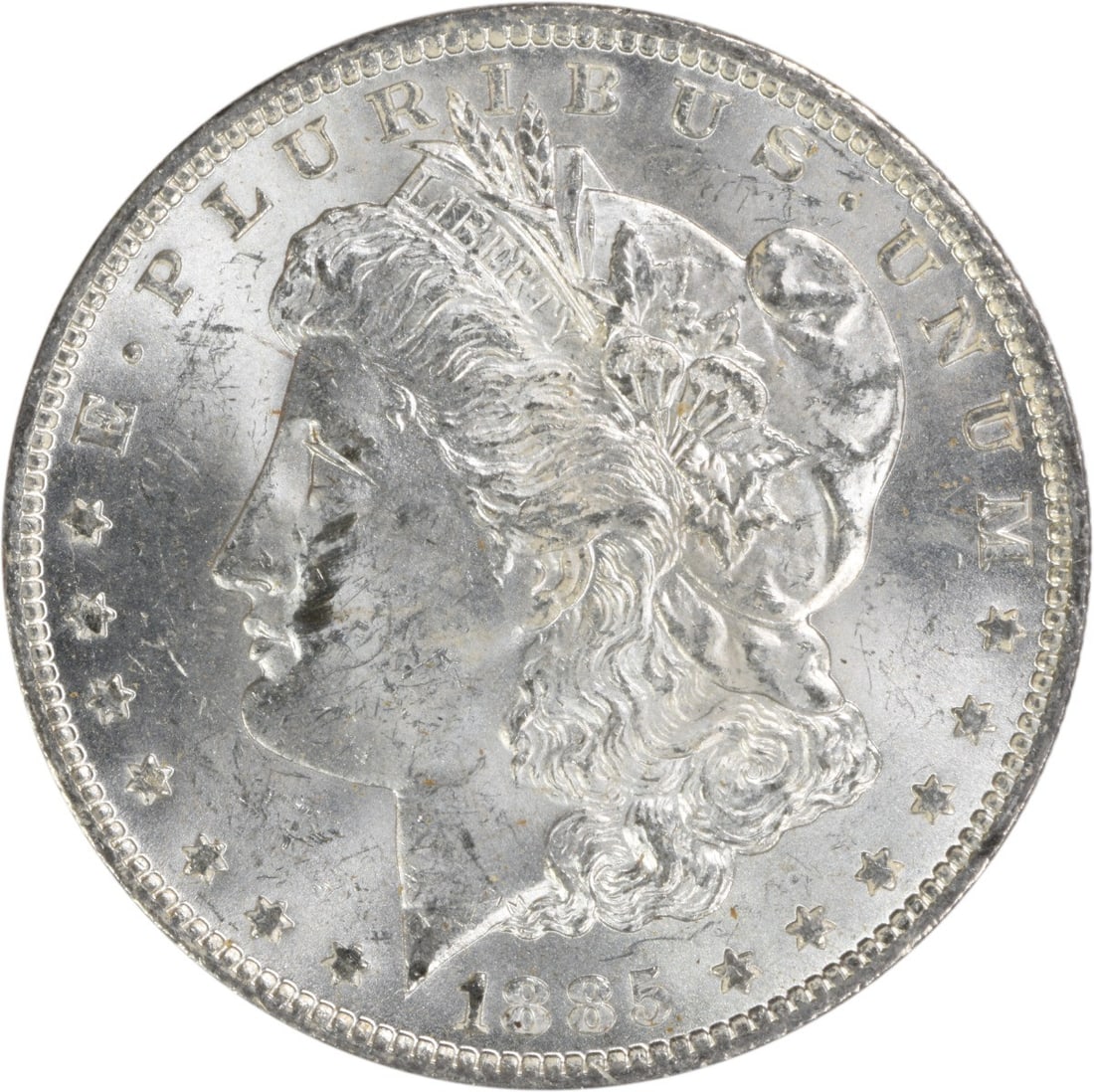Uncirculated 1885 O Silver Dollar Morgan BU Uncertified US Coin: Uncirculated 1885 O Silver Dollar Morgan BU Uncertified US Coin This is an uncirculated 1885-O Morgan Silver Dollar from the New Orleans Mint. The coin is composed of silver and is in Brilliant Uncirc