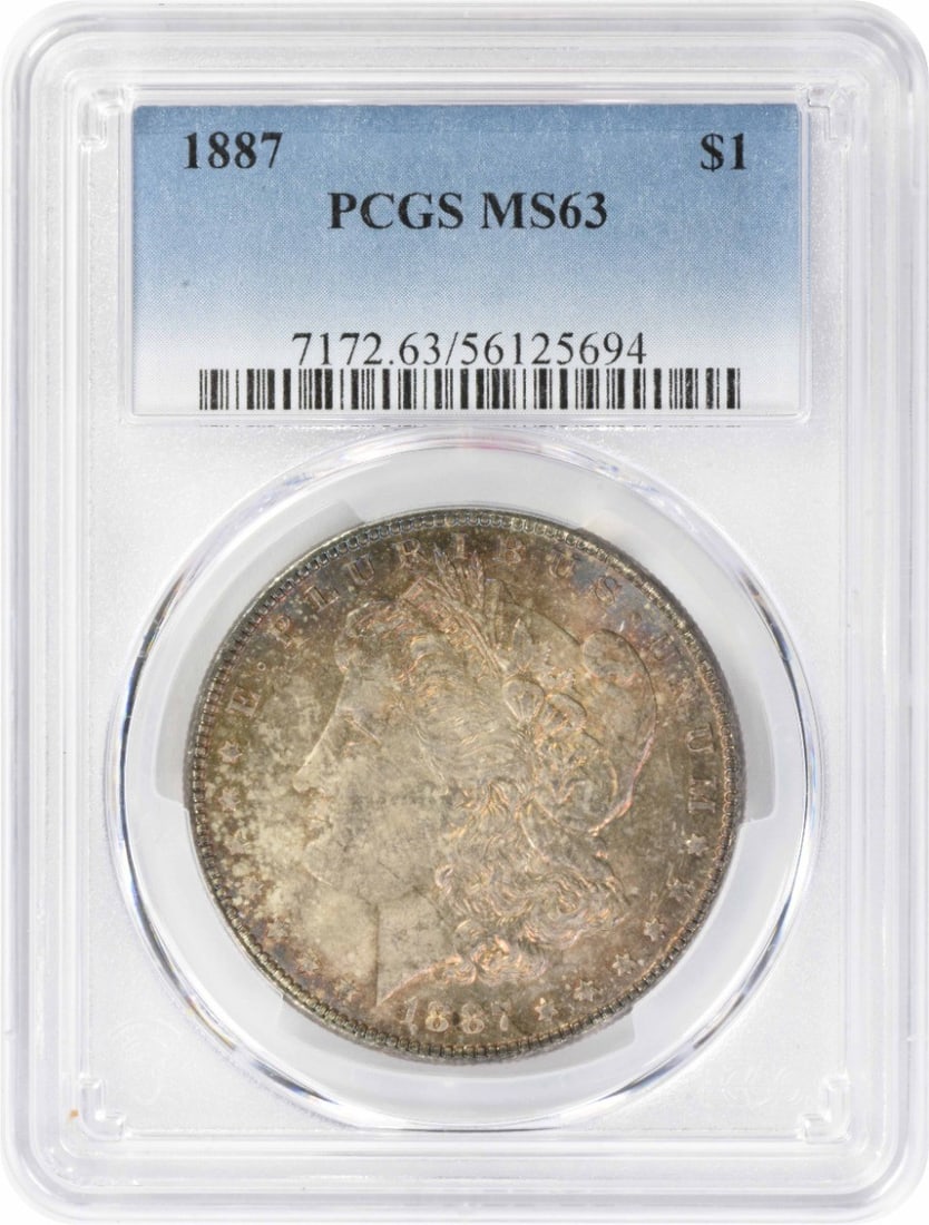 PCGS MS63 1887 Morgan $1 Silver Dollar Toned: PCGS MS63 1887 Morgan $1 Silver Dollar Toned 1887 Morgan Silver Dollar graded MS63 by PCGS. This uncirculated silver coin is toned and is a pre-owned piece. Specifications Coin: Morgan Silver Dollar Y
