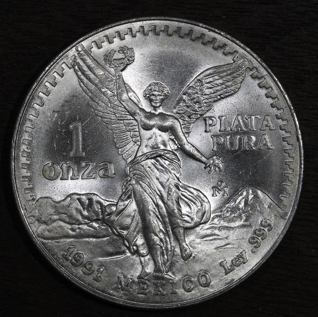1991 Mexico Libertad 1 oz .999 Silver Onza Coin: 1991 Mexico Libertad 1 oz .999 Silver Onza Coin 1991-Mo Mexico Silver Libertad Onza bullion coin struck in .999 fine silver. This pre-owned coin is an ungraded and uncertified 1 oz issue from the Mexi