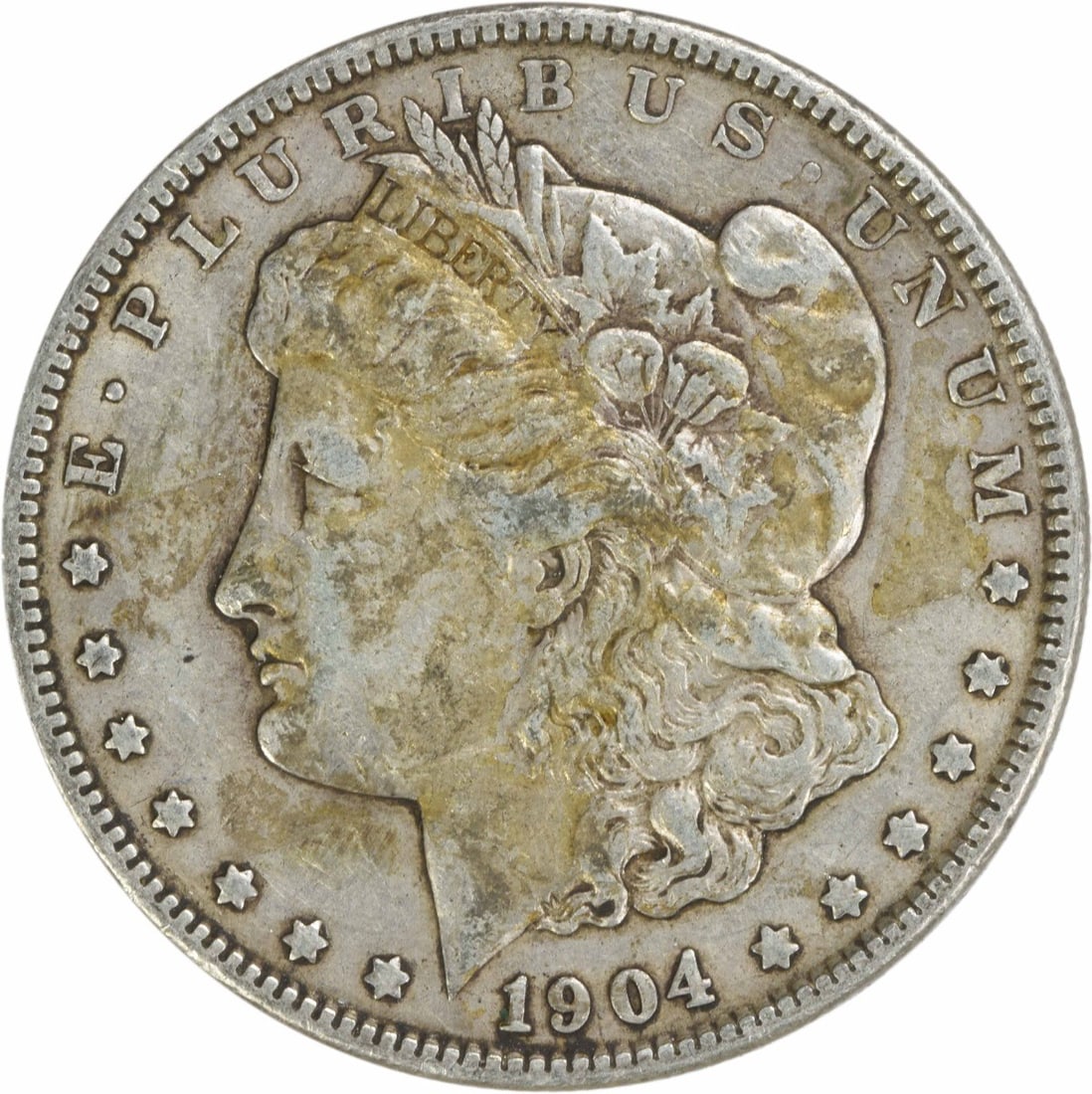 1904 Morgan Silver Dollar EF Uncertified 90% Silver Coin: 1904 Morgan Silver Dollar EF Uncertified 90% Silver Coin This 1904 Morgan Silver Dollar is a captivating piece of history, featuring the renowned design by George T. Morgan. With an EF (Extremely Fine