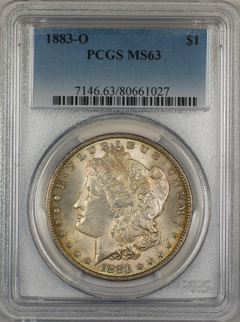 PCGS MS 63 1883 O Morgan Silver Dollar Toned: PCGS MS 63 1883 O Morgan Silver Dollar Toned 1883-O Morgan Silver Dollar $1 coin graded PCGS MS-63 with toning. This uncirculated United States silver coin is a certified example from the New Orleans 