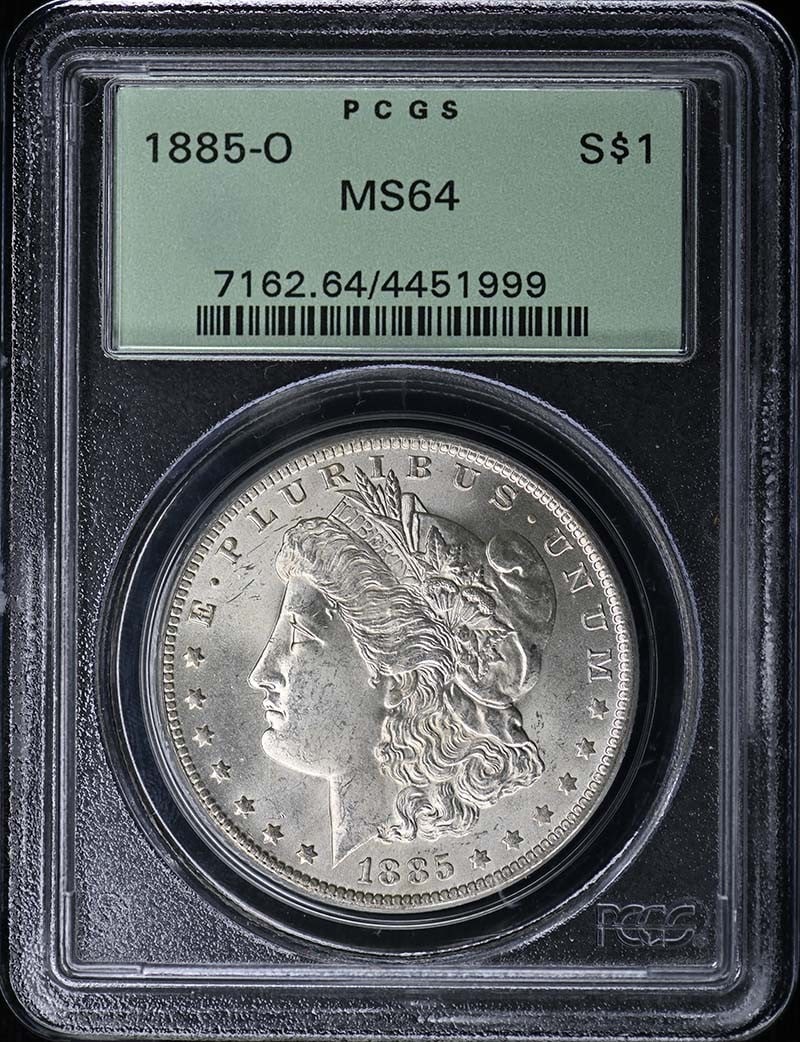 PCGS MS64 1885 O Morgan Silver Dollar $1: PCGS MS64 1885 O Morgan Silver Dollar $1 1885-O Morgan Dollar certified by PCGS and graded MS64. This uncirculated United States silver dollar is a pre-owned coin from the New Orleans Mint. Specificat
