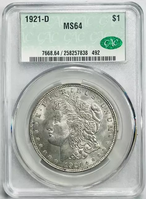 1921-D USA Silver Dollar Morgan CAC MS 64: 1921-D USA Silver Dollar Morgan CAC MS 64 1921-D Morgan Silver Dollar certified by CAC and graded MS 64. This pre-owned silver dollar is a USA issue from Denver and comes encapsulated in a protective 
