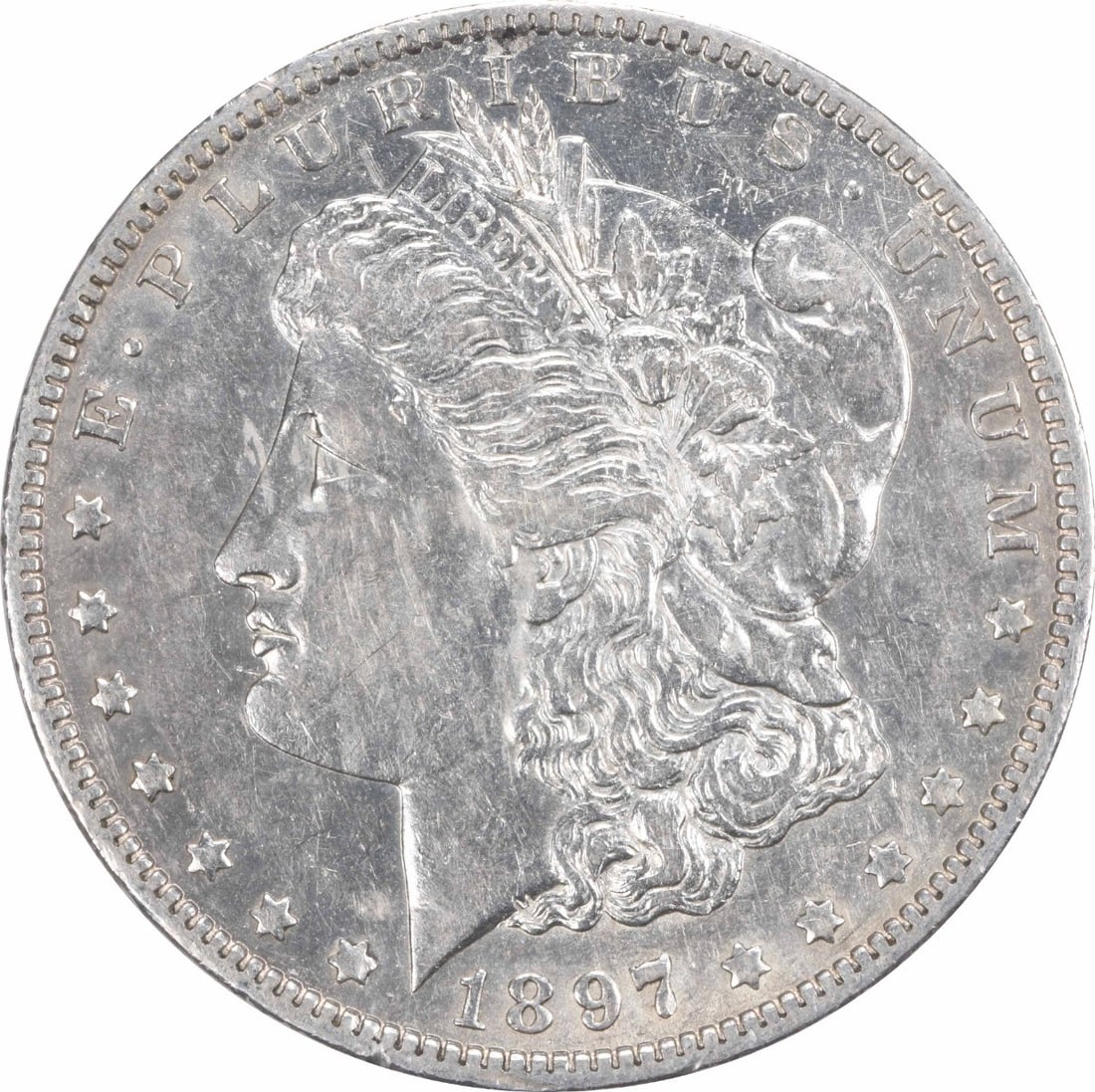 1897-O Morgan Silver Dollar AU Uncertified New Orleans Coin: 1897-O Morgan Silver Dollar AU Uncertified New Orleans Coin This 1897-O Morgan Silver Dollar is a remarkable piece of numismatic history, featuring a stunning design by George T. Morgan. Crafted from 
