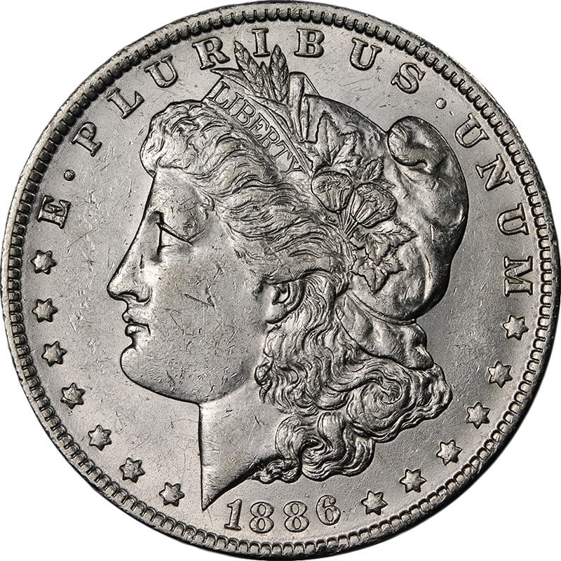 1886 O Morgan Silver Dollar AU BU Uncertified: 1886 O Morgan Silver Dollar AU BU Uncertified 1886-O Morgan Silver Dollar graded Choice AU/BU with bright white color, nice luster, nice strike, and strong overall eye appeal. This pre-owned coin is u