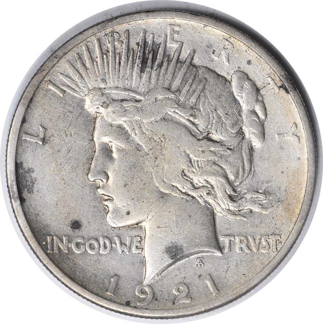 1921 Peace Dollar VAM 3 Line Through L VF Silver Uncertified: 1921 Peace Dollar VAM 3 Line Through L VF Silver Uncertified 1921 Peace Dollar, VAM 3 "Line Through L" variety. This circulated silver $1 coin is offered in VF grade and remains uncertified. Pre-owned