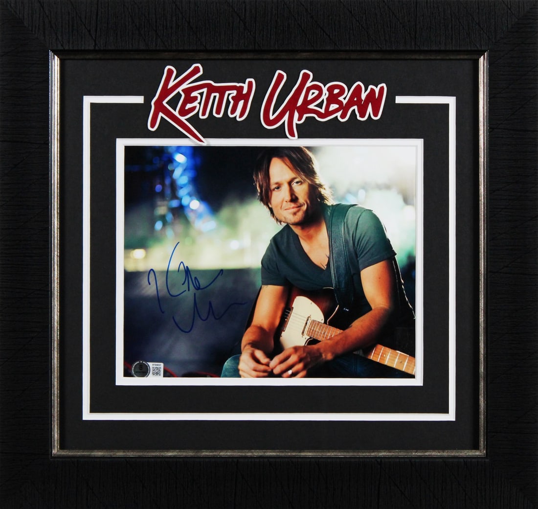 Keith Urban Signed 8x10 Framed Photo Beckett Authenticated: Keith Urban Signed 8x10 Framed Photo Beckett Authenticated This authentic 8x10 photograph features the signature of country music star Keith Urban, personally signed for fans and collectors. The photo
