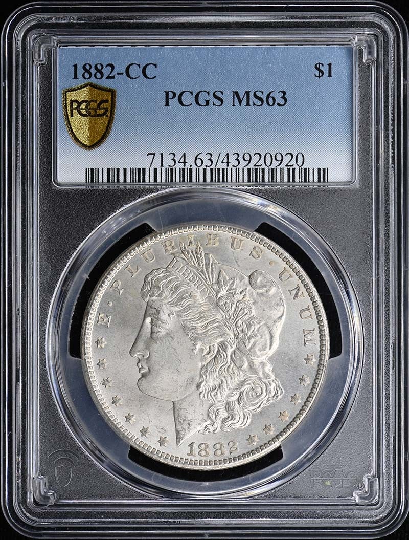 PCGS MS63 1882 CC Morgan Silver Dollar $1: PCGS MS63 1882 CC Morgan Silver Dollar $1 1882-CC Morgan Dollar certified by PCGS and graded MS63. This pre-owned coin is an uncirculated example from the United States with Carson City mint location 