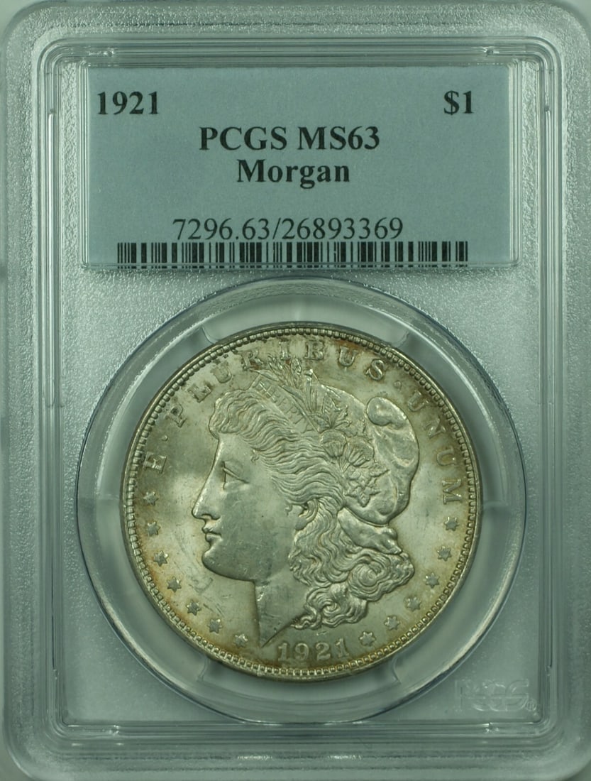 PCGS MS-63 1921 Morgan Silver Dollar $1 Philadelphia Mint: PCGS MS-63 1921 Morgan Silver Dollar $1 Philadelphia Mint This 1921 Morgan Silver Dollar is certified by PCGS with a grade of MS-63. Minted in Philadelphia, it features a denomination of $1 and is com