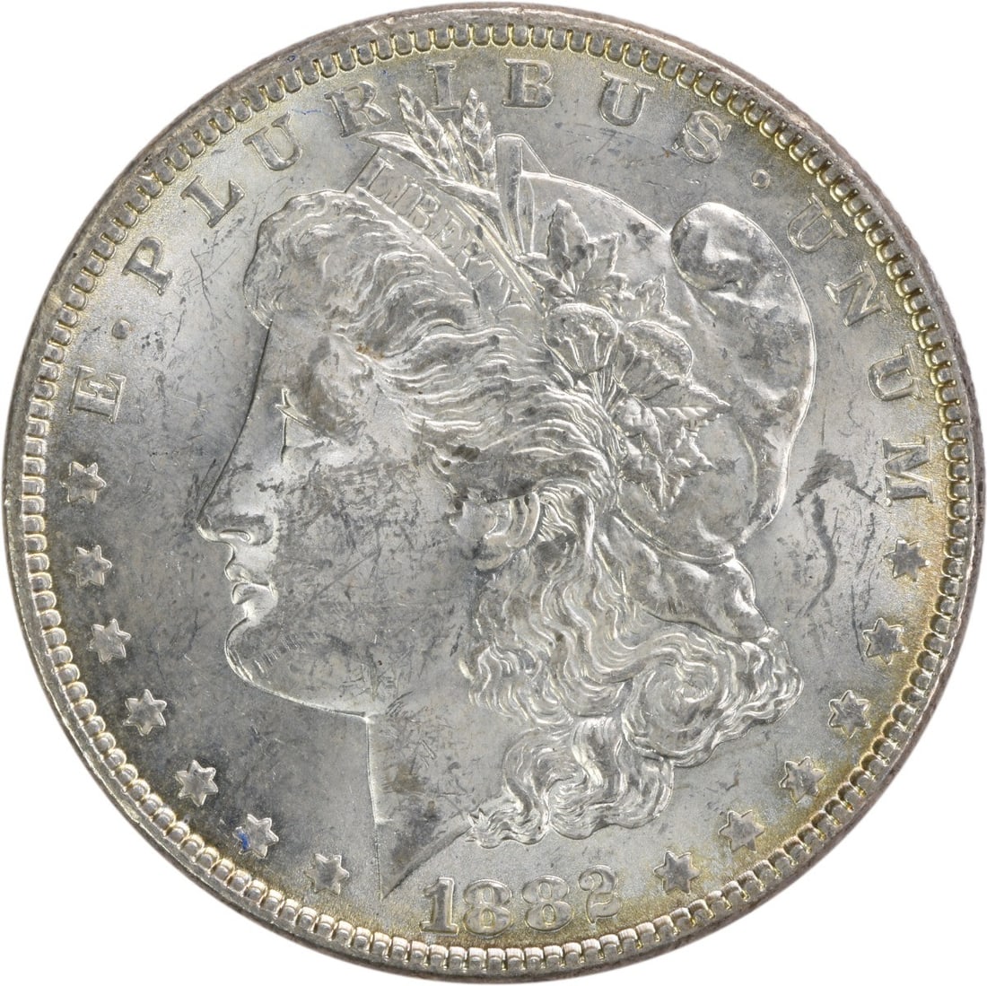 Uncirculated 1882 Morgan Dollar Silver Coin No Mint Mark Choice BU: Uncirculated 1882 Morgan Dollar Silver Coin No Mint Mark Choice BU This 1882 Morgan Silver Dollar is an uncirculated coin struck in silver. It features no mint mark and is classified as Choice Brillia