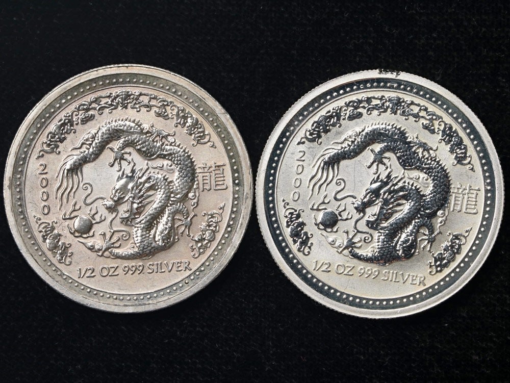 Australia 2000 Year of Dragon Lunar Series I 2x 1/2 Oz Silver 50c: Australia 2000 Year of Dragon Lunar Series I 2x 1/2 Oz Silver 50c Original 2000 Australia Lunar Series I Year of the Dragon silver 50 cent coin listing noted as an impaired example. This pre-owned coi