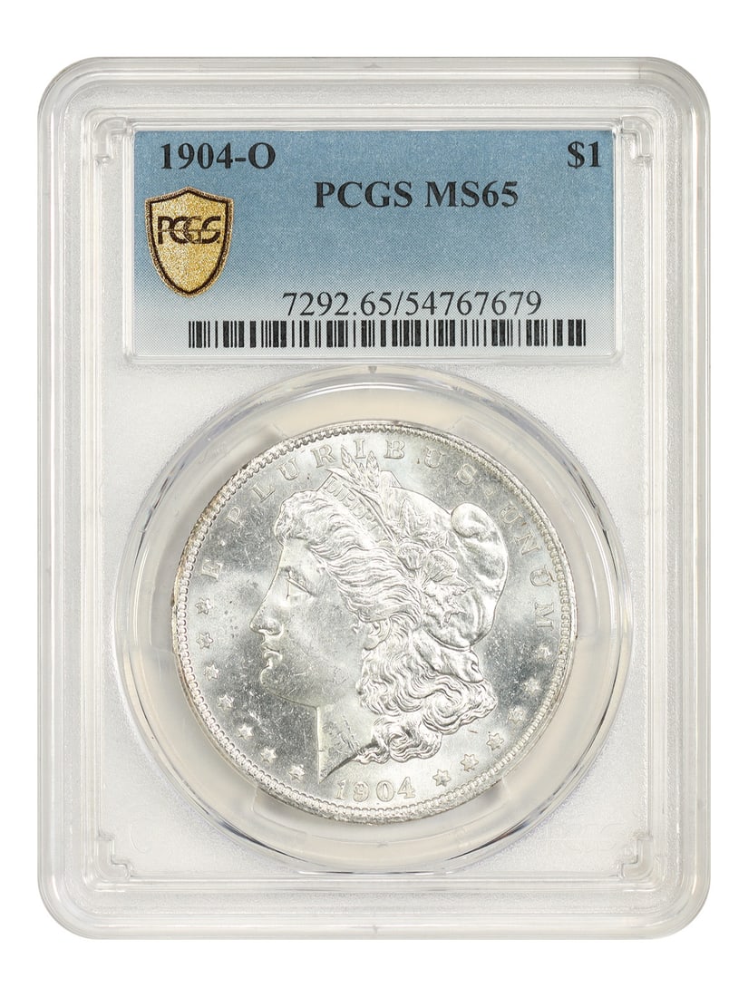 PCGS MS65 1904 O Morgan Silver Dollar New Orleans Mint: PCGS MS65 1904 O Morgan Silver Dollar New Orleans Mint 1904-O Morgan Dollar certified by PCGS in MS65 condition. This uncirculated coin is a popular final-year New Orleans Mint Morgan dollar issue. As