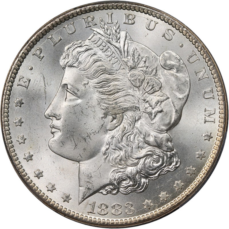 PCGS MS65 1883-CC Morgan Silver Dollar Uncirculated Silver Coin: PCGS MS65 1883-CC Morgan Silver Dollar Uncirculated Silver Coin An 1883-CC Morgan Silver Dollar graded PCGS MS65. This pre-owned coin is described as uncirculated and features superb eye appeal, fanta