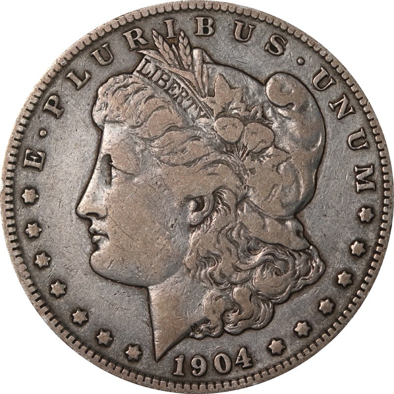 1904 S Morgan Dollar US Silver Coin: 1904 S Morgan Dollar US Silver Coin 1904-S Morgan Silver Dollar coin from the United States. This pre-owned example is uncertified and circulated, with silver composition and 0.9 fineness. Specificati