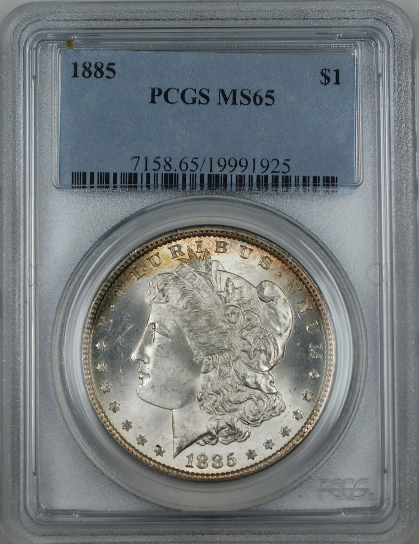 PCGS MS 65 1885 Morgan Silver Dollar $1: PCGS MS 65 1885 Morgan Silver Dollar $1 1885 Morgan Silver Dollar coin certified by PCGS and graded MS-65. This uncirculated United States $1 coin is composed of silver and comes encapsulated in a pro