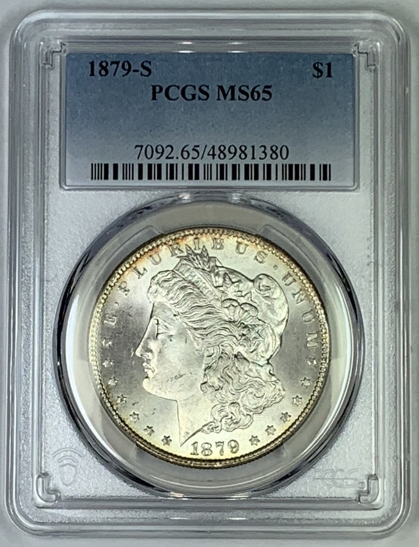 PCGS MS 65 Certified 1879-S Morgan Silver Dollar Coin: PCGS MS 65 Certified 1879-S Morgan Silver Dollar Coin This 1879-S Morgan Silver Dollar features a grade of MS 65 and has been certified by PCGS. The coin is composed of silver, remains uncirculated, a